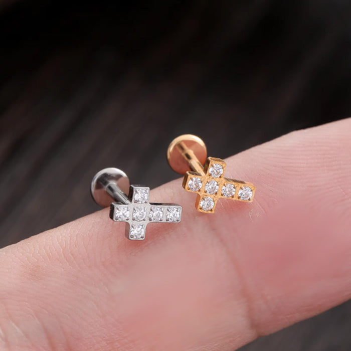 Kreuz piercing