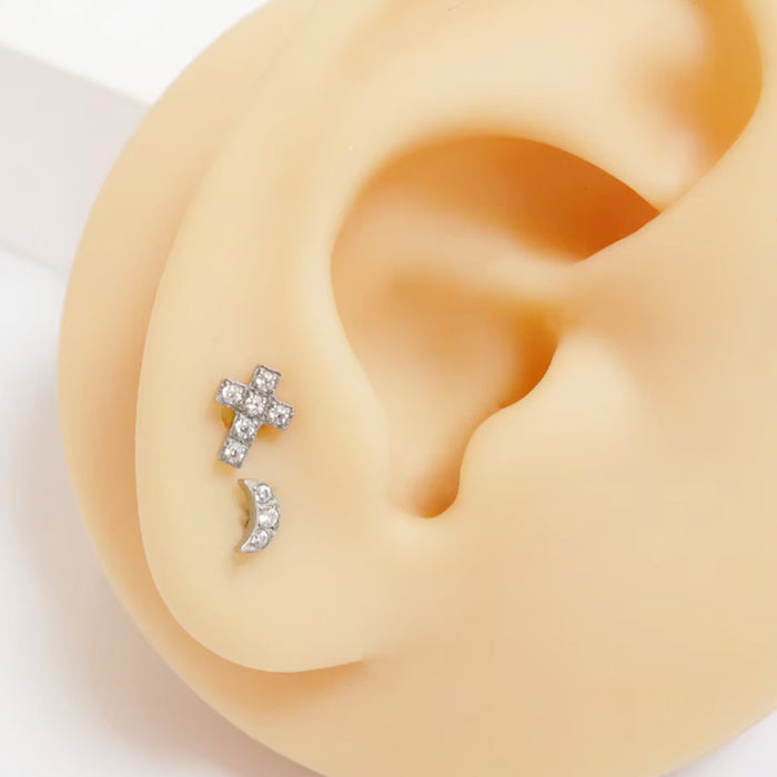 Kreuz piercing